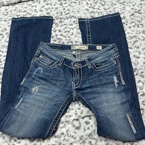 Buckle distressed denim bootcut jeans